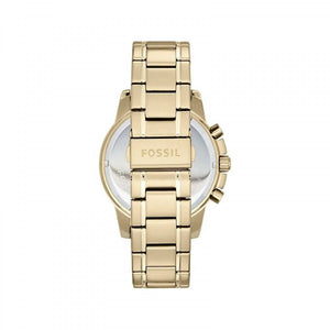Gold Fossil watch on a white background