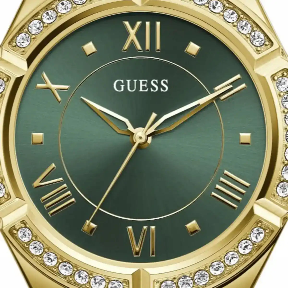 Close-up of Guess Cosmo GW0033L8 showing the green dial and crystal bezel