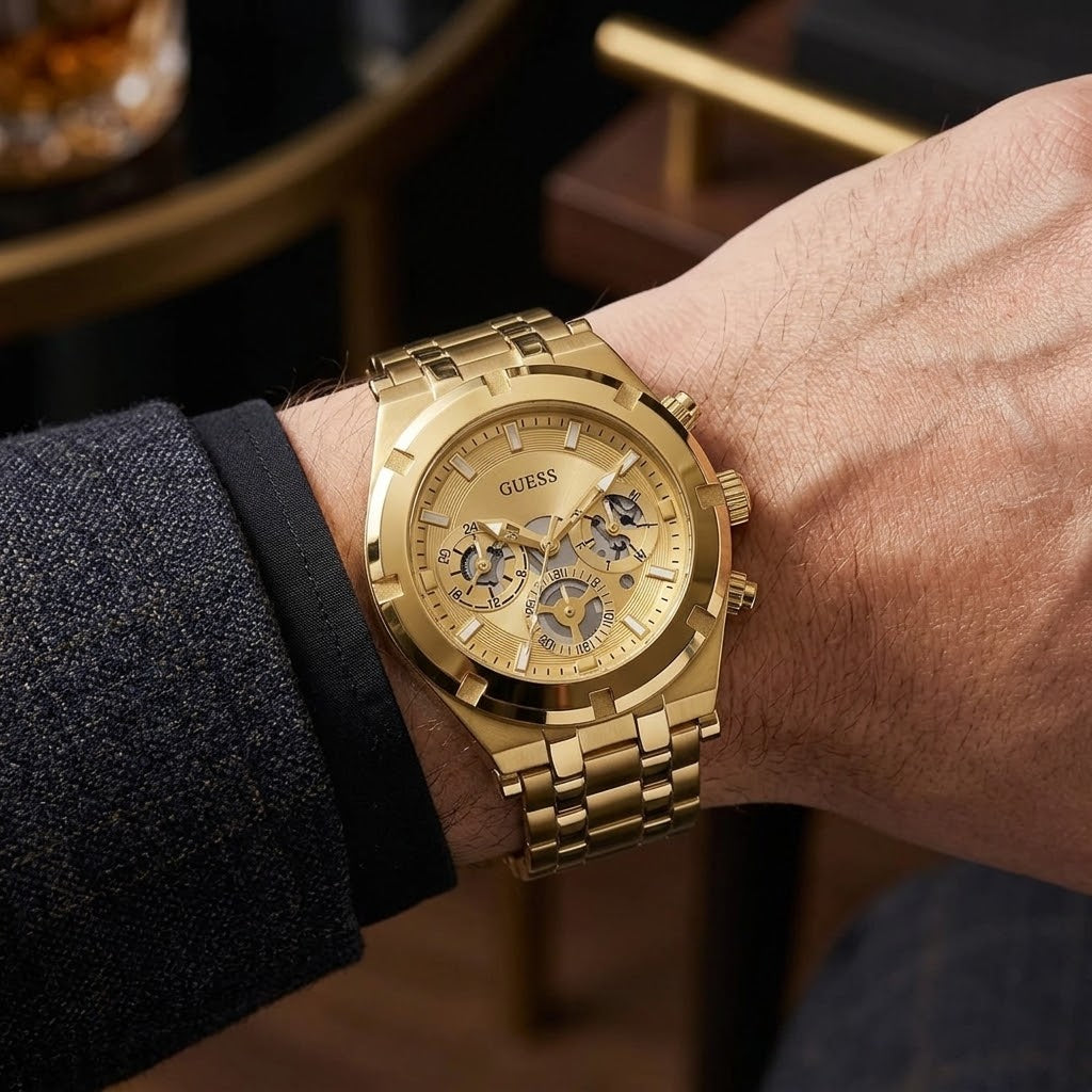 Guess GW0260G4 men's Continental gold tone stainless steel multifunction watch on wrist