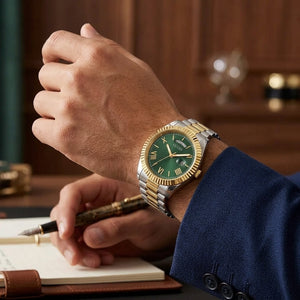 Front view of GUESS Connoisseur GW0265G8 men's watch with green Roman numeral dial