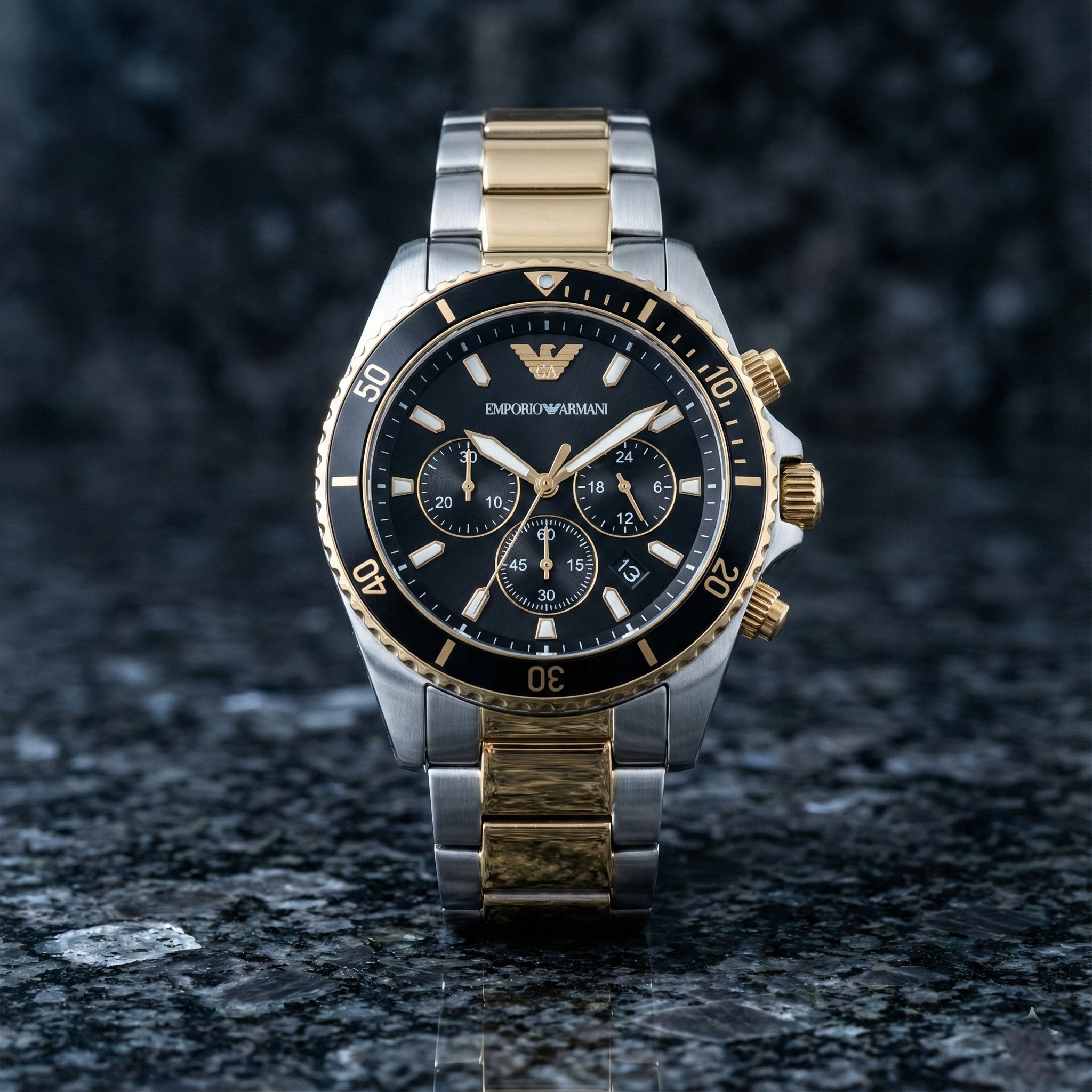 Luxury Emporio Armani watch with black dial and gold accents on a dark textured surface
Close-up of AR11680 black dial showing solar technology and gold indices