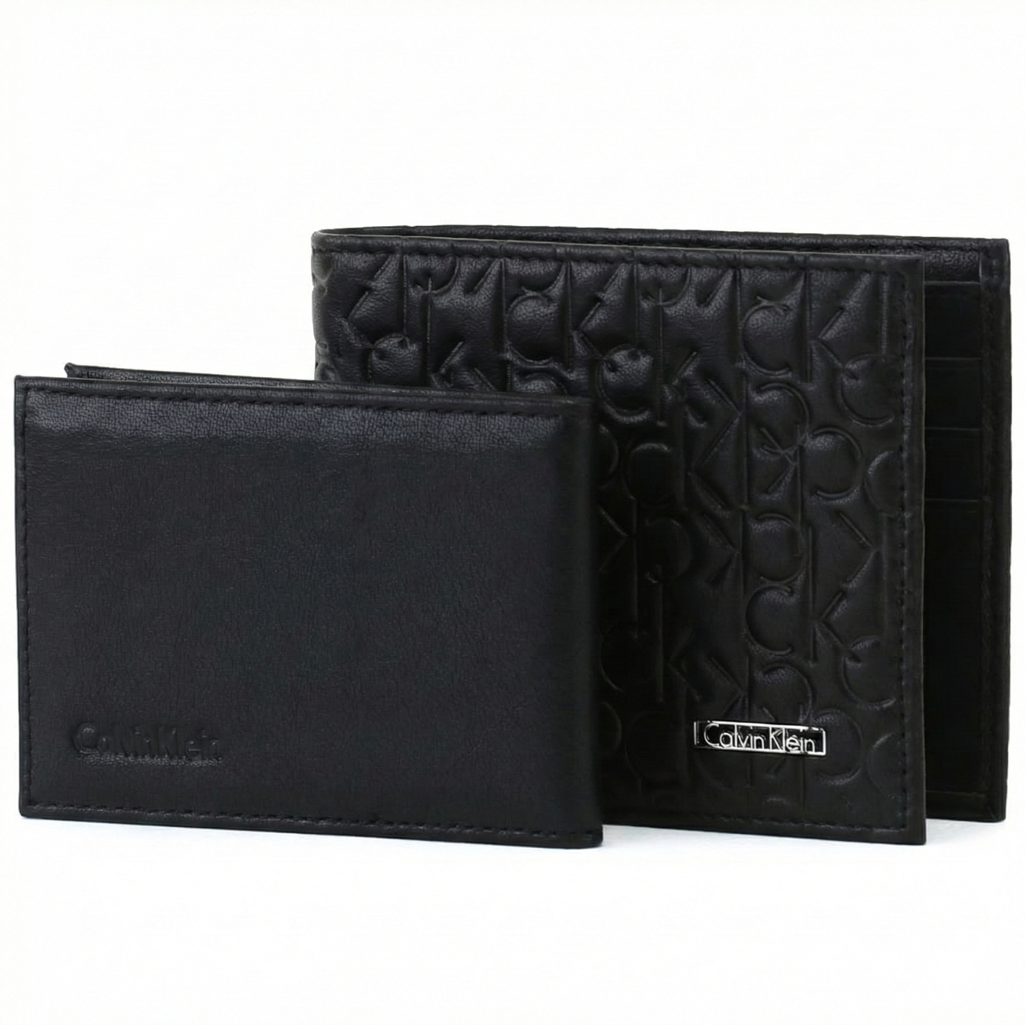 Two black wallets with embossed design on a white background, featuring the Calvin Klein brand.