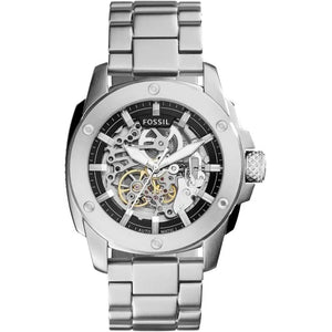 Silver Fossil watch with a detailed face on a white background