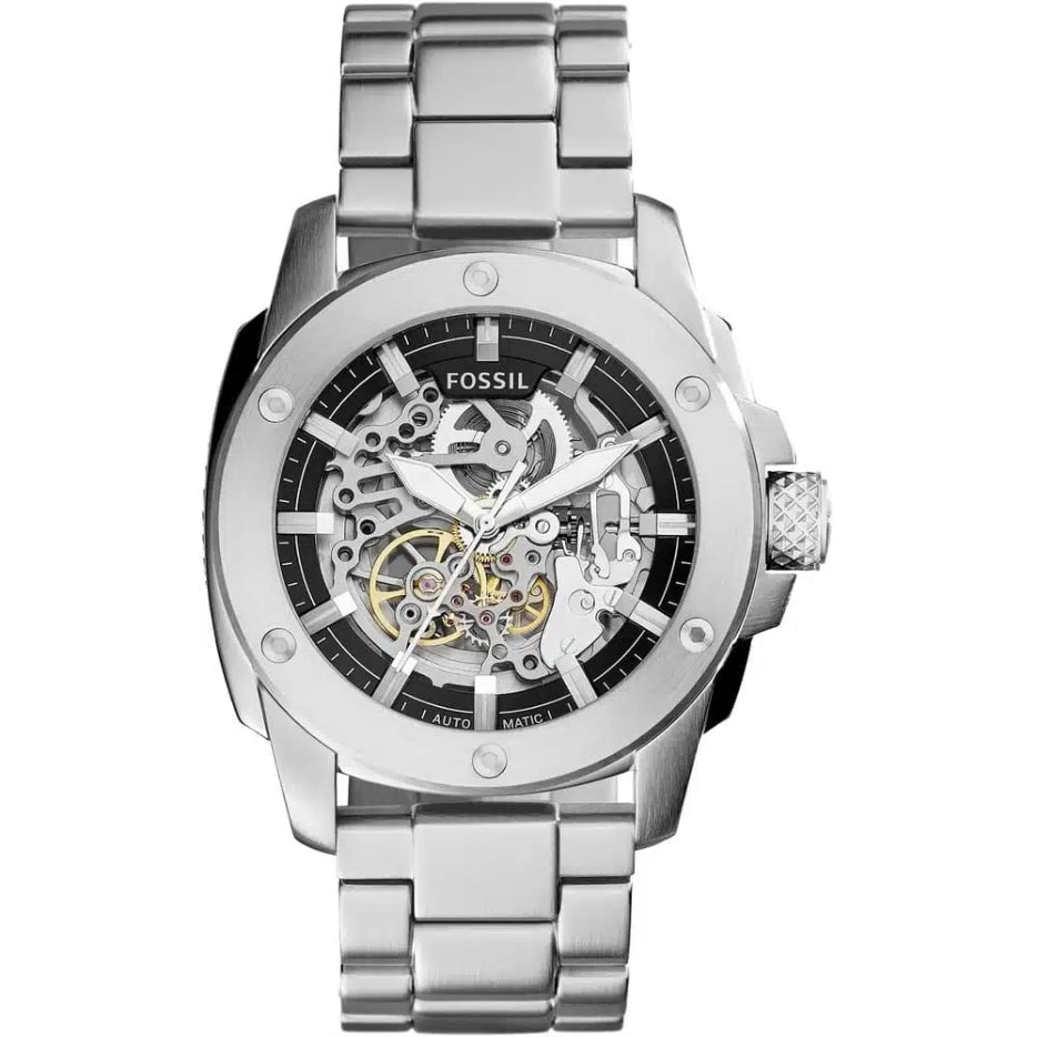 Silver Fossil watch with a detailed face on a white background