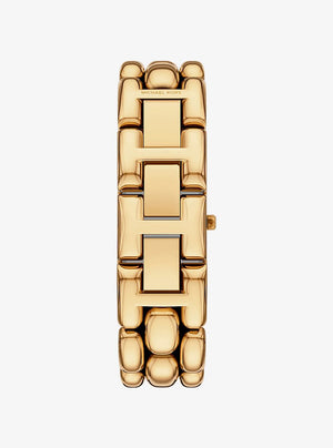 Michael Kors gold-tone metal link bracelet watch shown vertically against a light gray background.