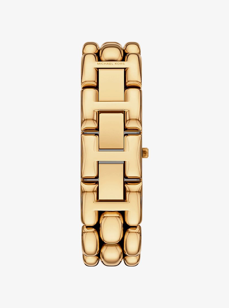 Michael Kors gold-tone metal link bracelet watch shown vertically against a light gray background.