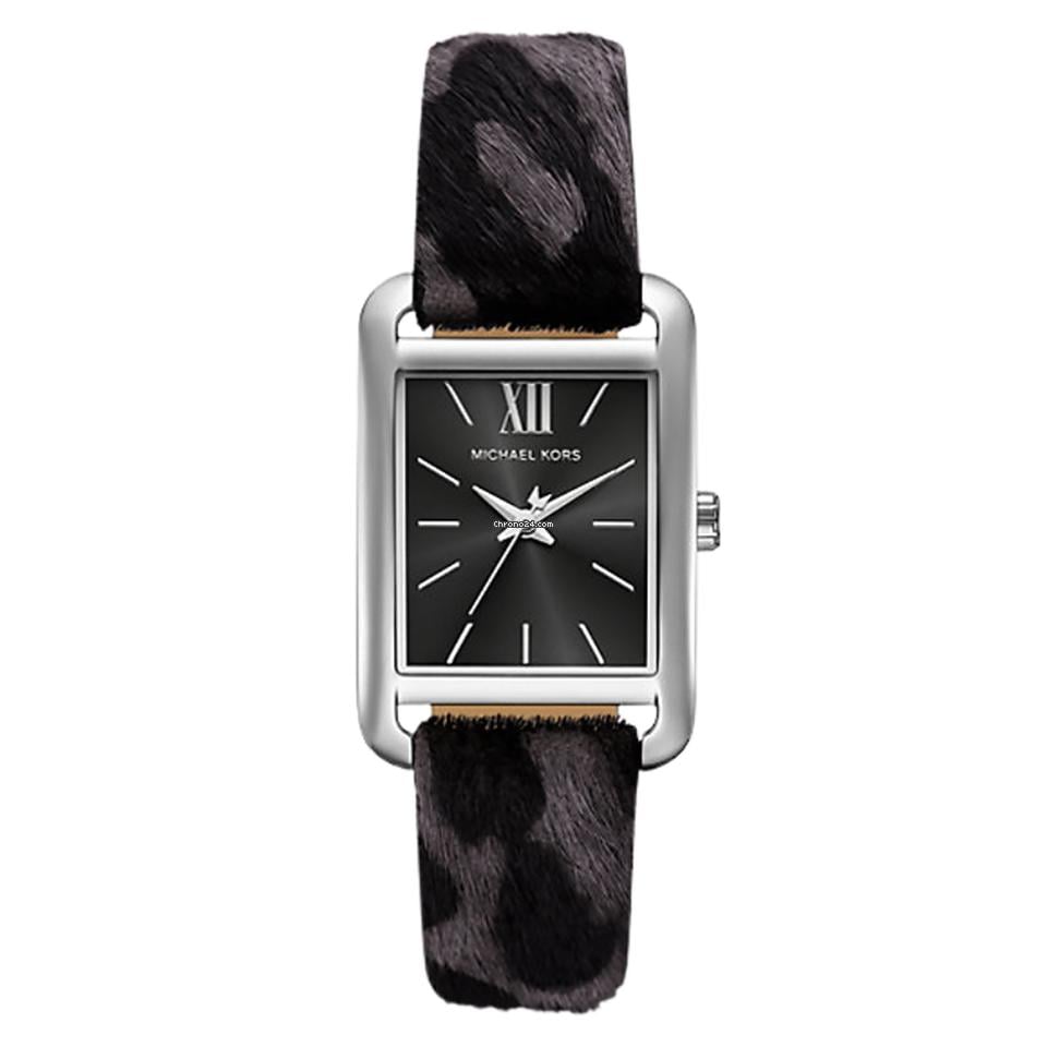 Authentic real-life photo of Michael Kors MKo1199 showing actual grey leopard print strap and black dial
