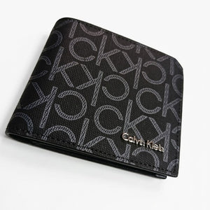 Professional angled studio photograph of the sleek Calvin Klein mirror original black leather bi-fold wallet covered in grey ck monogram