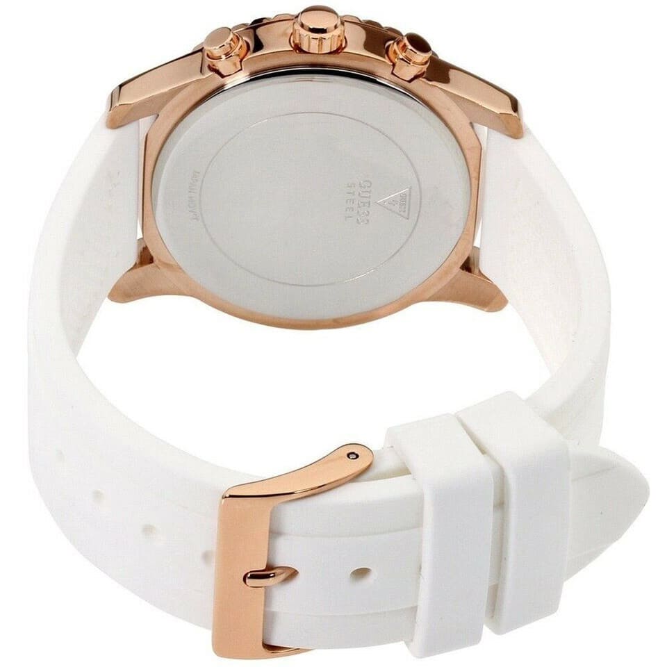 Caseback of Guess Solar W1135L1 women's quartz battery multi-function watch showing technical specs 30m water resistance and stainless steel material