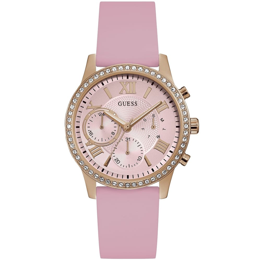 Guess Solar W1135L2 women's quartz battery multi-function watch with cushion-shaped gold-tone case, dynamic bezel embellished with crystals and screw details, deep silver-white dial with yellow gold luminous indices, and integrated flexible light pink silicone rubber strap main view