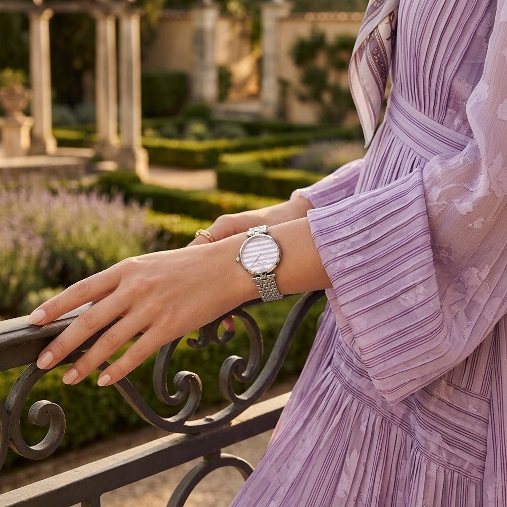 Female model wearing Emporio Armani Arianna silver watch for a chic everyday look