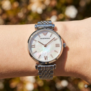 Close up shot of AR11204 highlighting the white mother of pearl dial with crystal markers and rose gold accents