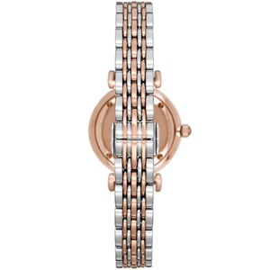 Two-tone watch with rose gold and silver band on a white background