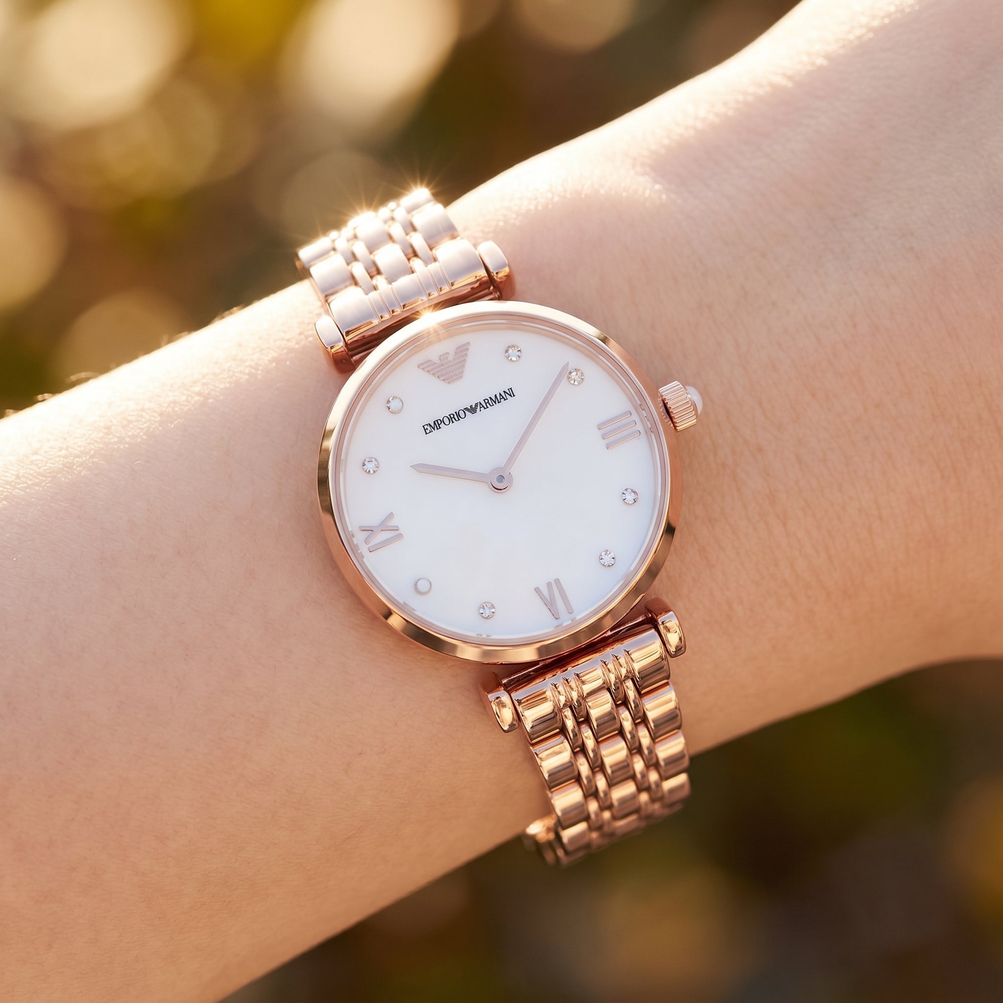 Close up shot of AR11267 highlighting the white dial and rose gold roman numerals with pearl indices