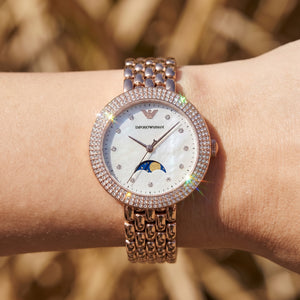 Close up shot of AR11462 highlighting the mother of pearl dial and moonphase window details