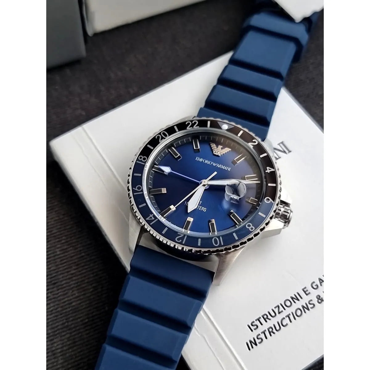 Angled shot of AR11592 showing the depth of the blue dial and light blue GMT hand