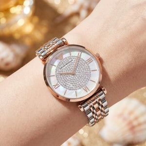 Close up shot of AR1926 highlighting the white dial with stunning crystal pave center and rose gold hands