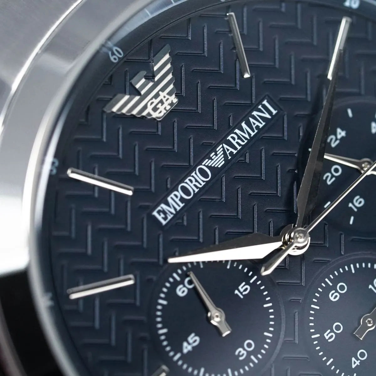 Close-up shot of Emporio Armani AR2486 blue dial showing chevron texture
