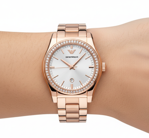 Extreme close-up of Armani AR11558 showing date at 6 and crystal bezel