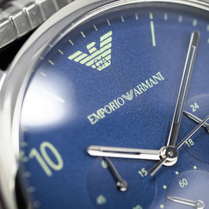Close-up shot of Emporio Armani AR1942 blue dial with silver Arabic numerals
