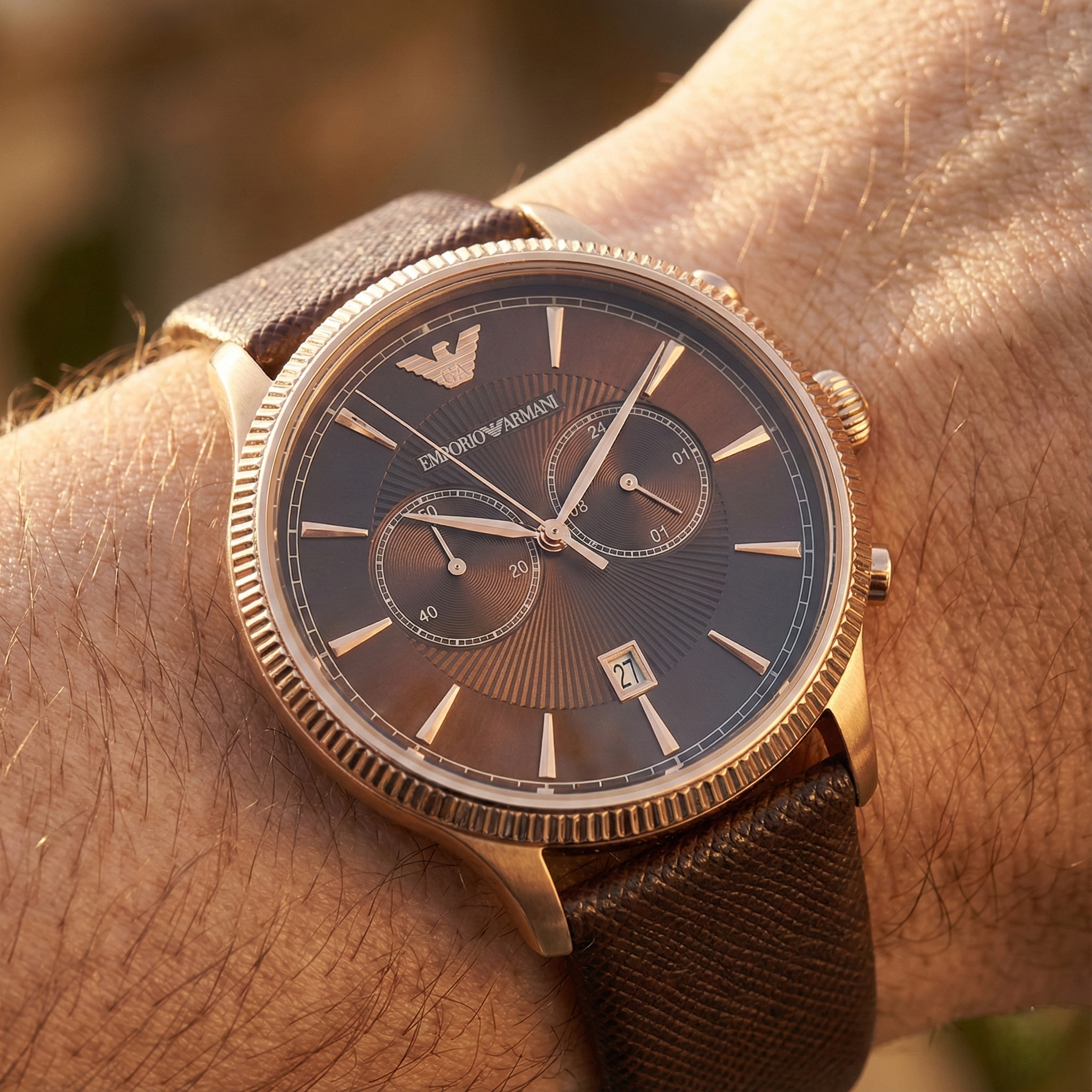 Close up of Armani AR1793 showing saffiano textured leather strap and brown dial