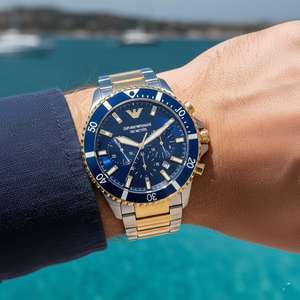Extreme wrist macro of Armani AR11362 blue dial and gold indices with linen cuff