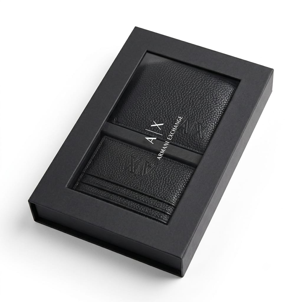 Live angled view of the closed Armani Exchange premium presentation gift box featuring the silver brand logo text centered on the black cover