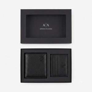 Live top-down view of the closed Armani Exchange premium presentation gift box featuring the silver brand logo text centered on the black cover