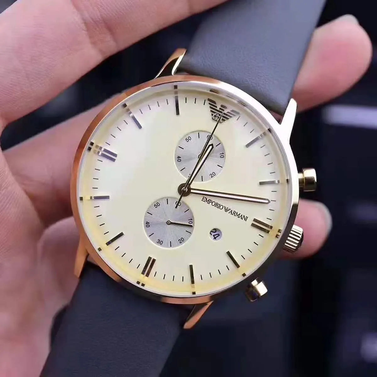 Emporio Armani AR0386 Gianni on wrist showing the classic beige and gold combination