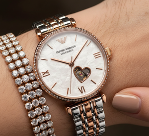 Extreme close-up of Armani AR60049 heart-shaped open aperture showing gears