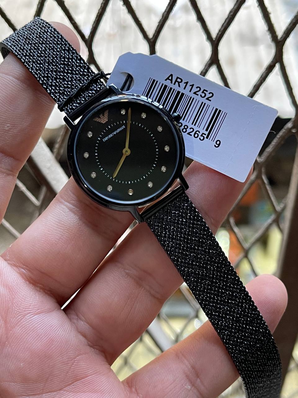 Emporio Armani Kappa AR11252 on wrist showing sleek modern black aesthetic