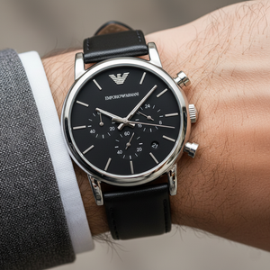 Extreme wrist macro of Armani AR1733 showing black dial and classic leather strap