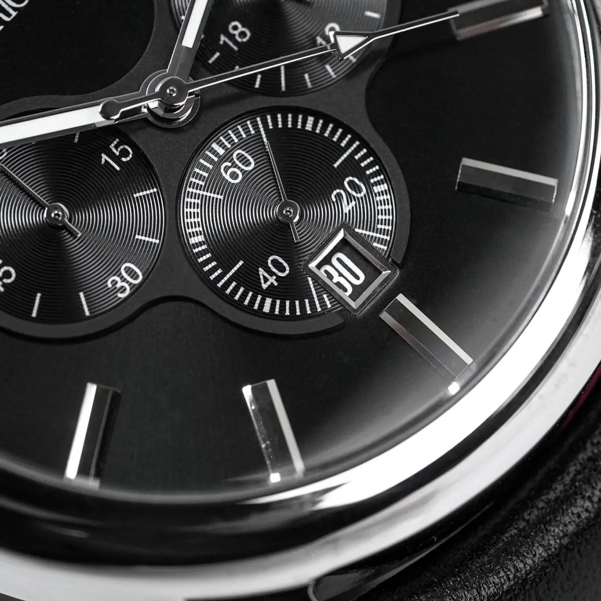 Close-up shot of Emporio Armani AR0431 square black dial with silver indices