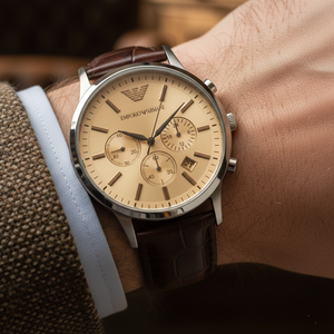 Extreme wrist macro of Armani AR2433 showing crocodile embossed leather and cream dial