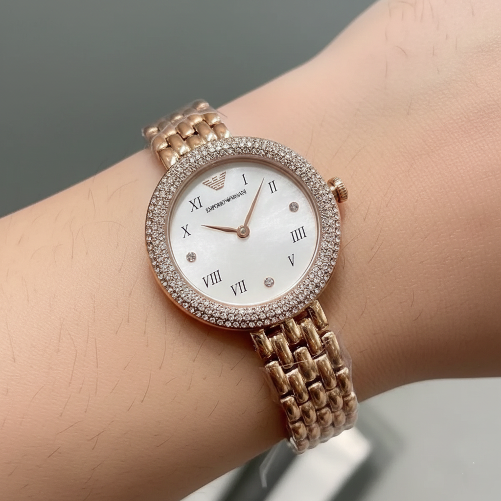 Royal elegance: Woman wearing Emporio Armani AR11355 rose gold crystal watch