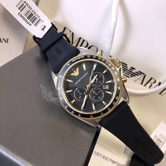 Extreme close-up of the high-quality rubber texture and embossed lettering on the AR80003 strap