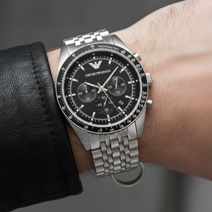 Extreme wrist macro of Armani AR5988 black dial and tachymeter bezel details