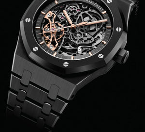 Audemars Piguet Royal Oak 15416CE.OO.1225CE.01 men's automatic watch, openworked dial, black ceramic bracelet – angle close-up on dark background