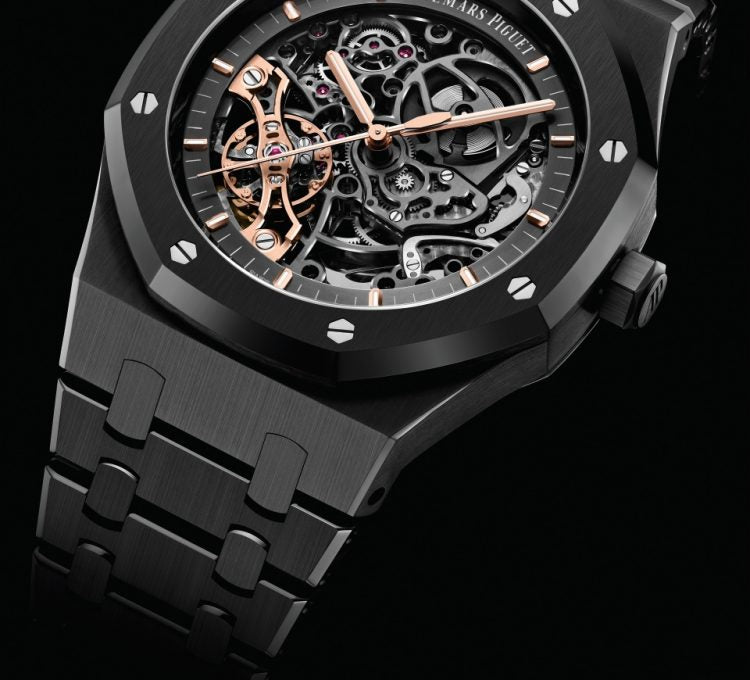 Audemars Piguet Royal Oak 15416CE.OO.1225CE.01 men's automatic watch, openworked dial, black ceramic bracelet – angle close-up on dark background