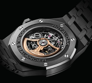 Audemars Piguet Royal Oak 15416CE.OO.1225CE.01 men's automatic watch, openworked dial, black ceramic bracelet – caseback view on dark background