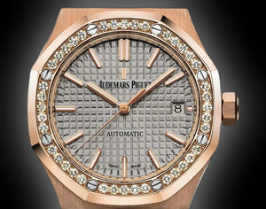 Audemars Piguet Royal Oak 15451OR.ZZ.1256OR.02 women's automatic watch, grey dial, diamond bezel, rose gold bracelet – dial close-up on dark background