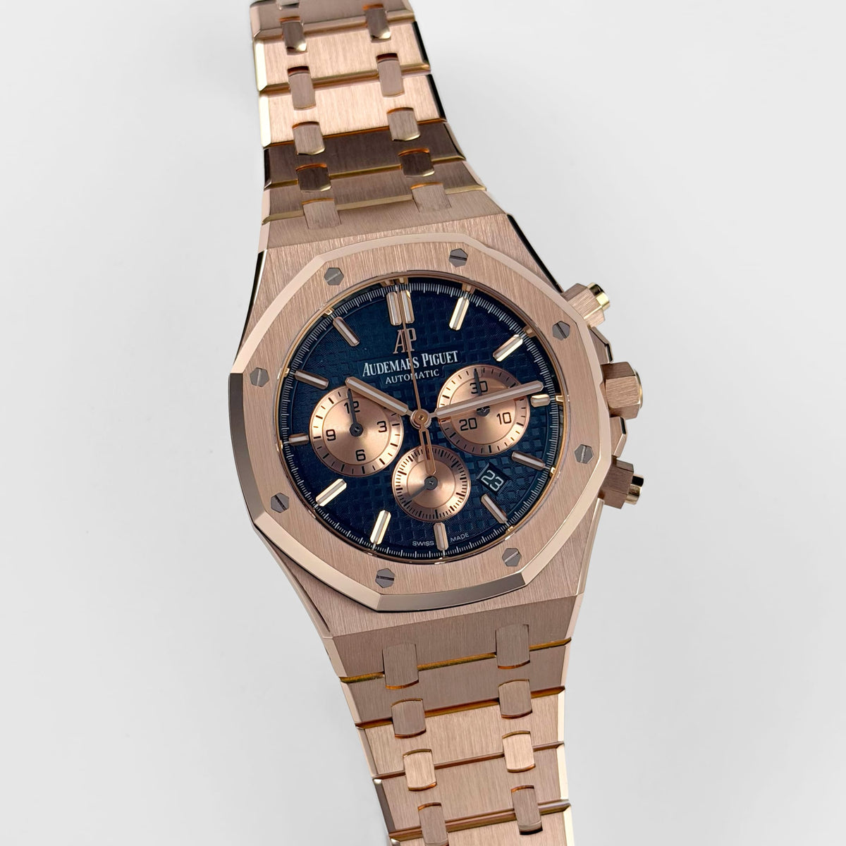 Audemars Piguet Royal Oak 26331OR.OO.1220OR.01 men's chronograph watch, blue dial, rose gold bracelet – angle view