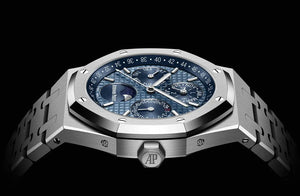 Audemars Piguet Royal Oak 26574ST.OO.1220ST.03 men's perpetual calendar watch, blue dial, silver stainless steel bracelet – side angle view on dark background