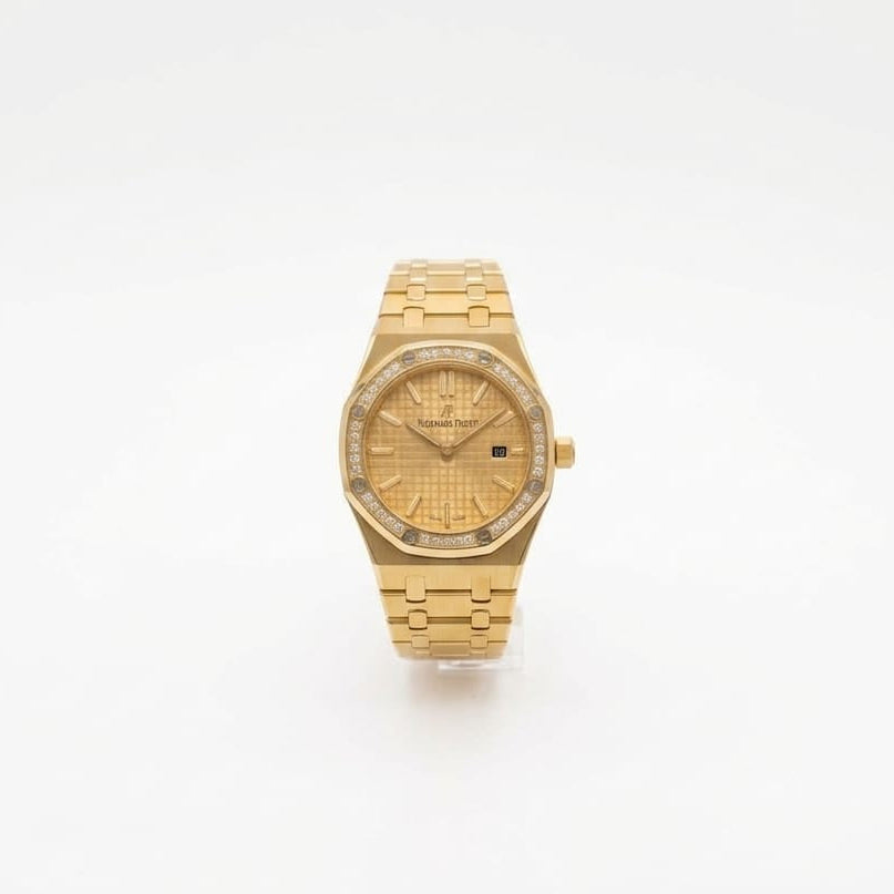 Audemars Piguet Royal Oak women's quartz watch, 33mm case, gold dial, diamond bezel, yellow gold strap – view 2