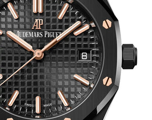 Audemars Piguet Royal Oak men's automatic watch, black dial, black bracelet – dial close-up on dark background