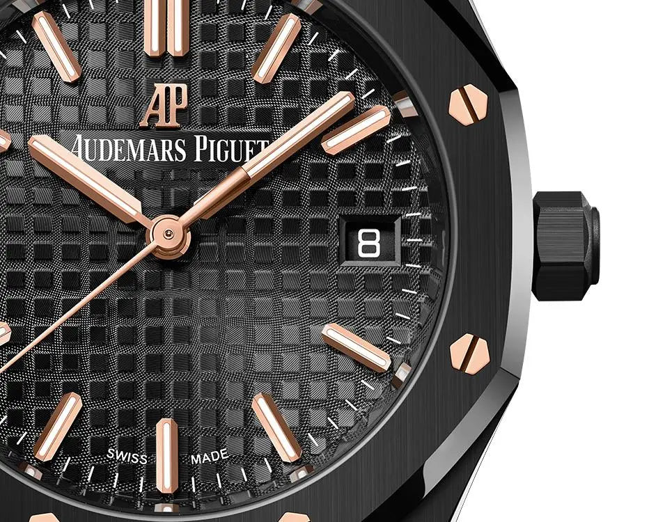 Audemars Piguet Royal Oak men's automatic watch, black dial, black bracelet – dial close-up on dark background