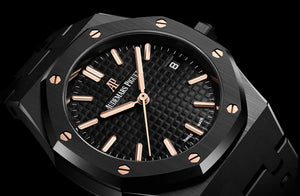 Audemars Piguet Royal Oak men's automatic watch, black dial, black bracelet – front view on dark background