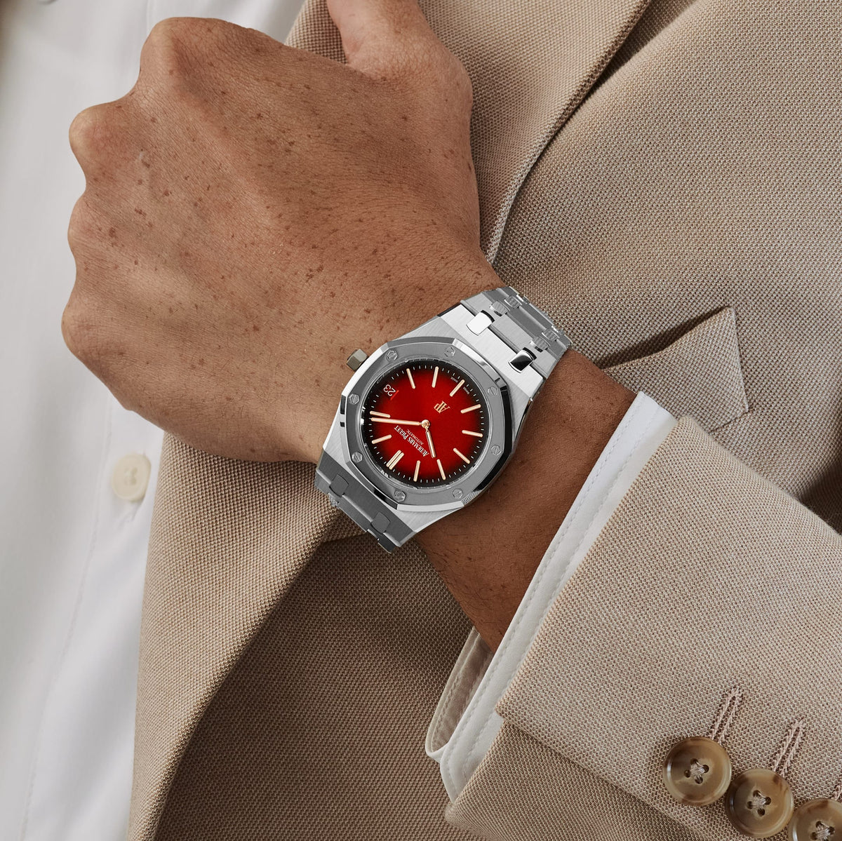 Audemars Piguet Royal Oak men's automatic watch, red gradient dial, silver stainless steel bracelet – on-wrist lifestyle view