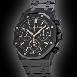 Audemars Piguet Royal Oak men's chronograph watch, black dial, black bracelet – full front view on dark background