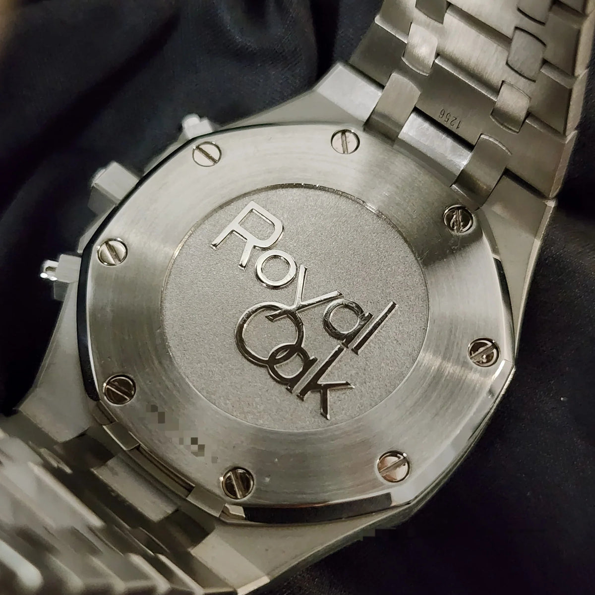 Audemars Piguet Royal Oak men's chronograph watch, grey dial, silver stainless steel bracelet – caseback close-up